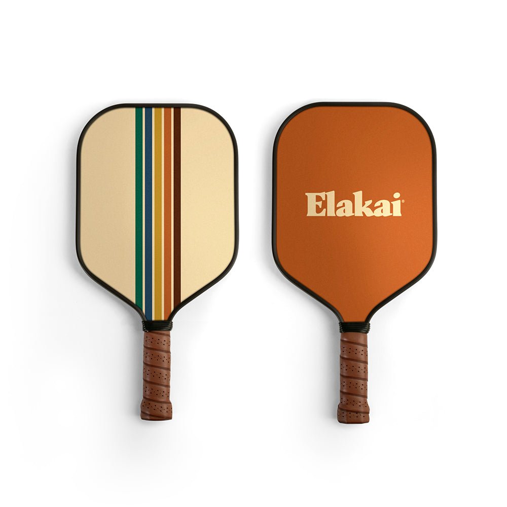 Two pickleball paddles with different designs on a white background, one featuring the brand 'Elakai'.