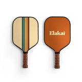 Two pickleball paddles with different designs on a white background, one featuring the brand 'Elakai'.
