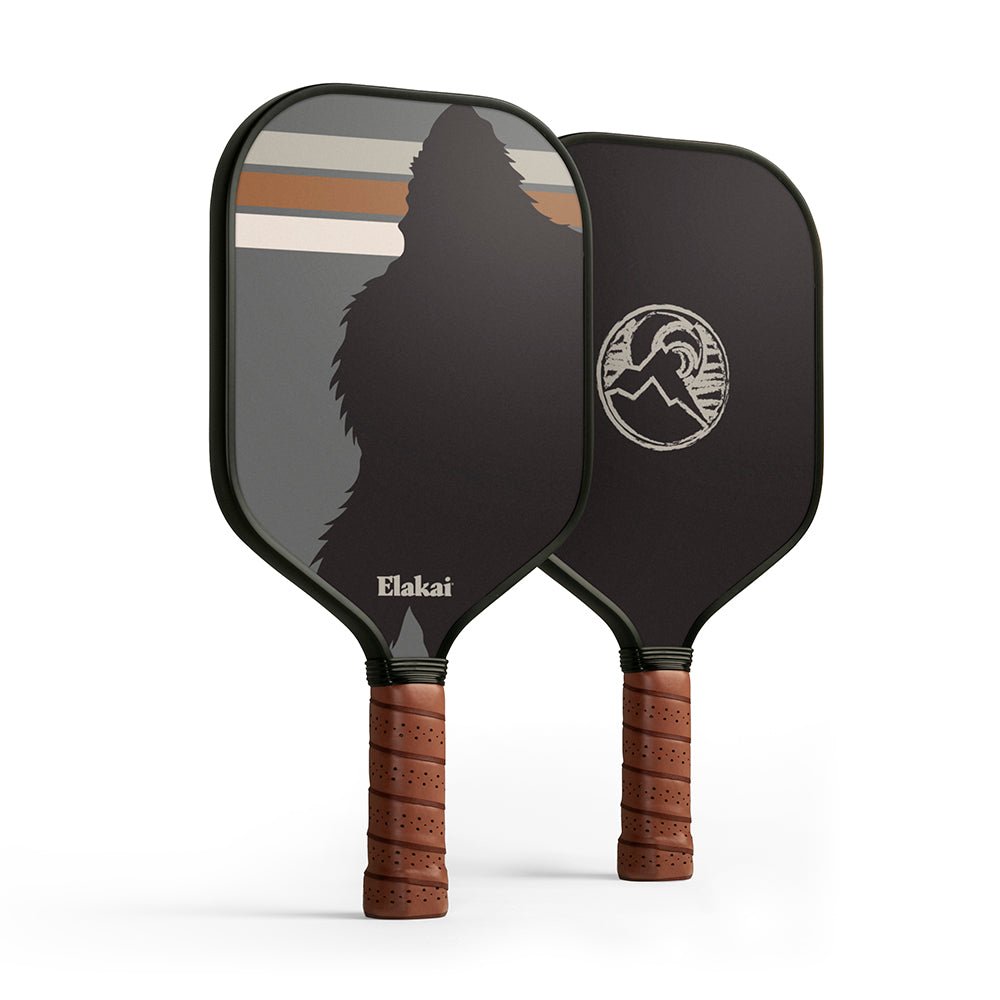 Two pickleball paddles with a silhouette design and Elakai branding on a white background