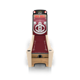Skee-ball machine with maroon top and wooden base on a white background