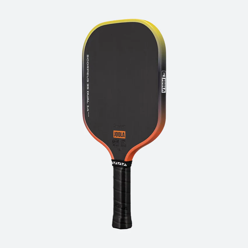 Pickleball paddle with black and orange design on a white background