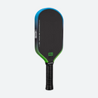 Pickleball paddle with black and green design on a white background