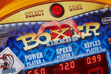 Close-up of Kalkomat Boxer Dynamic Boxing Game display showing multiple player mode options.