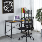 Home office setup with a desk, chair, and laptop, featuring the NHL logo on the wall.