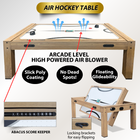Air hockey table with features highlighted on a white background