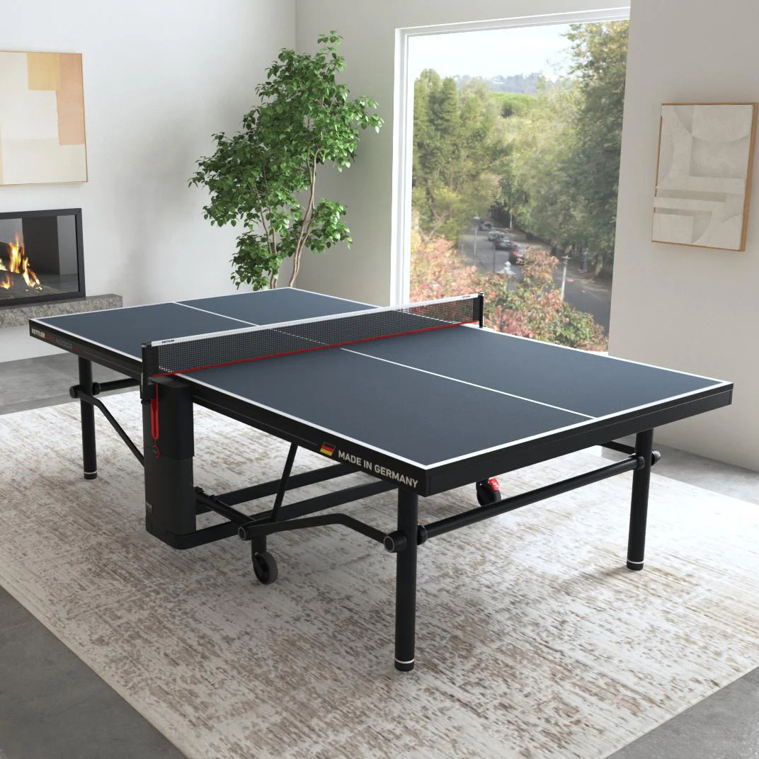 Kettler Pro Indoor 15 Table Tennis Table by Kettler set up in a modern living room.