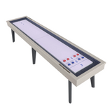 Shuffleboard table with red, blue, and white pucks on a white background