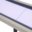Close-up of a whiteboard with blue lines on a gray frame