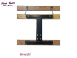 Wooden structure with metal brackets and 'First Team' branding on a white background