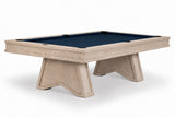 A modern pool table featuring a light beige wood frame and legs with a dark navy blue felt surface, shown on a clean white background.