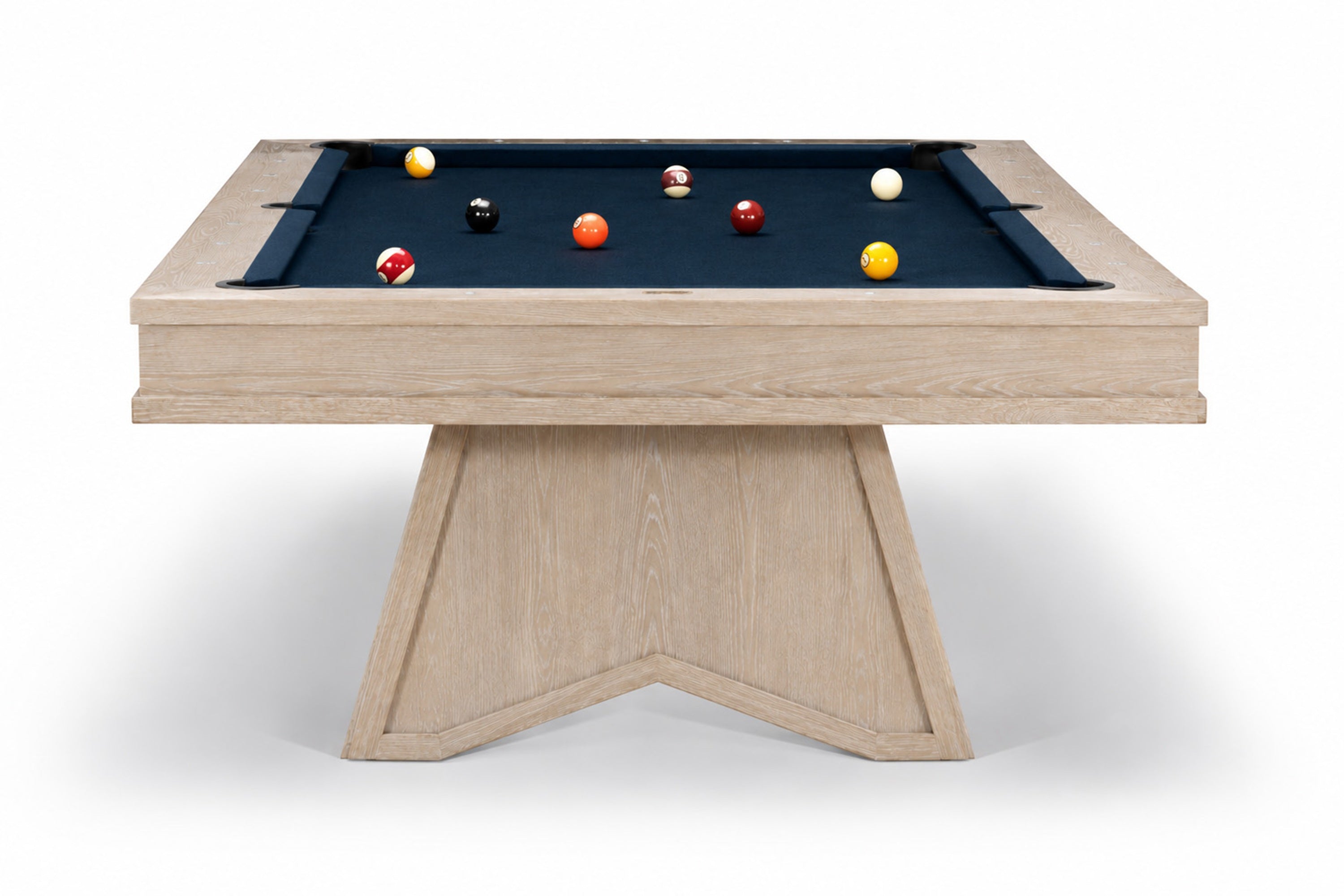 A modern pool table with a light natural wood frame and a dark green felt playing surface, shown from a high angle on a white background.
