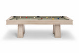 A modern pool table with a light natural wood frame and a green felt playing surface, shown with several billiard balls on a clean white background.