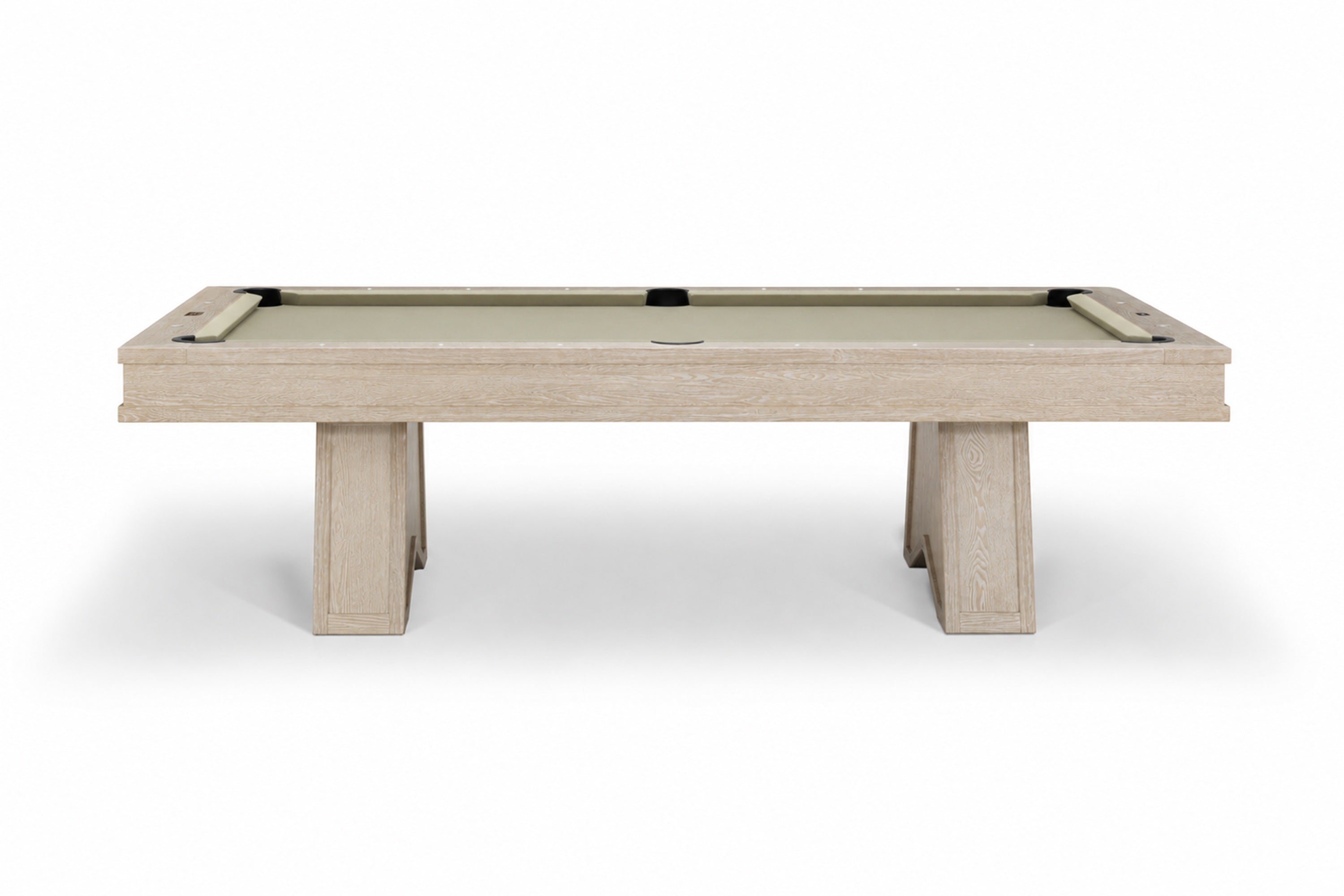 A modern pool table with a light beige wood frame and a beige felt playing surface, shown from a front-three-quarters angle on a white background.