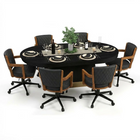 Round dining table set with chairs on a white background