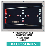 Pool table accessories set with balls, cues, brush, and chalk on a black felt background.