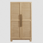 American Heritage Billiards Port Royal cabinet with louvered doors and vertical handles.