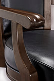 Close-up of the Brunswick Billiards Centennial Game Table in Espresso’s wooden armrest and surface.