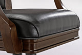 Close-up of Brunswick Billiards Centennial Game Table in Espresso with black leather chair cushion.