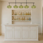A minimalist home bar with the RAM Game Room 84" Bar in antique white and a wine wall on the right.