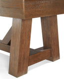 Close-up of angled wood legs on Brunswick Billiards Botanic 12' Shuffleboard Table, Rustic Brown.