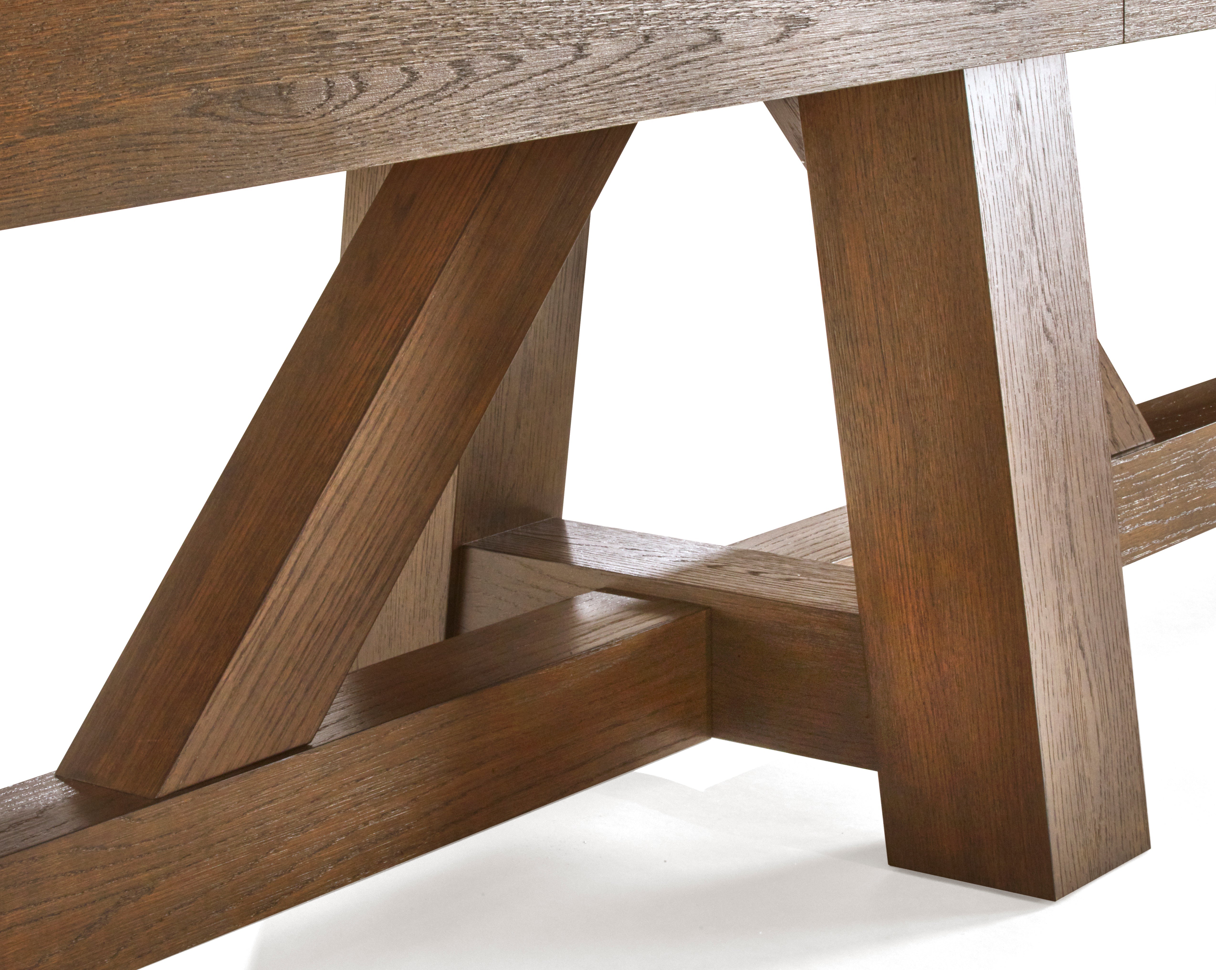 Close-up of Brunswick Billiards Botanic 12' Shuffleboard Table legs in rustic dark brown.