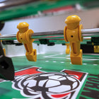 Close-up of yellow foosball players on a Tornado Elite II Table in Argent Frost.