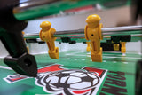 Close-up of yellow foosball players on a Tornado Elite II Table in Argent Frost.