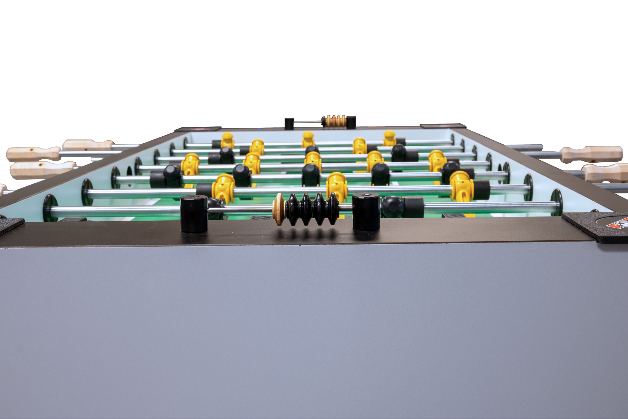 Close-up of a Tornado Elite II Foosball Table in Argent Frost with yellow and black rods.