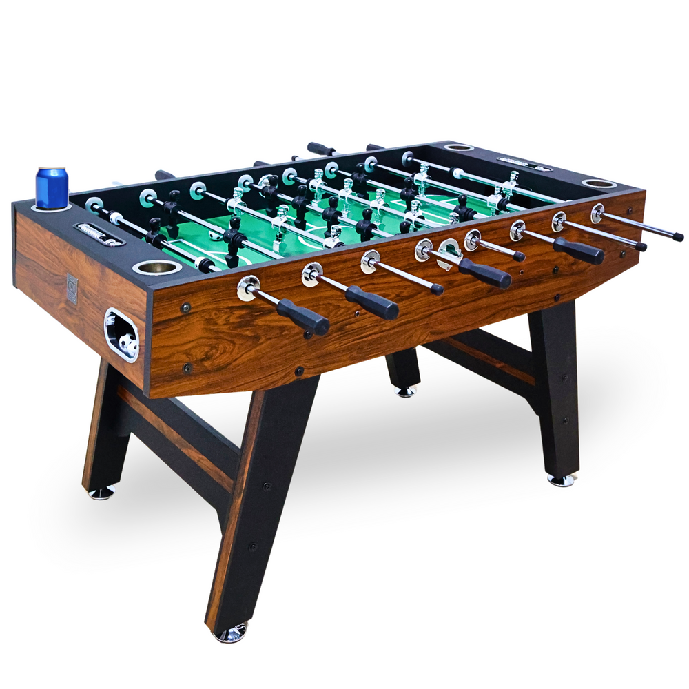 Foosball table with wooden finish and black legs on a white background