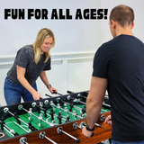 Two people playing foosball with text 'Fun for all ages!' above them.