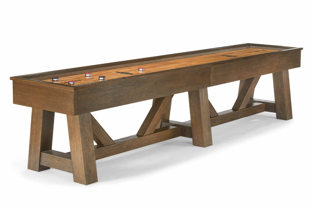 Brunswick Billiards Botanic 12' Shuffleboard Table in Rustic Dark Brown with pucks arranged.