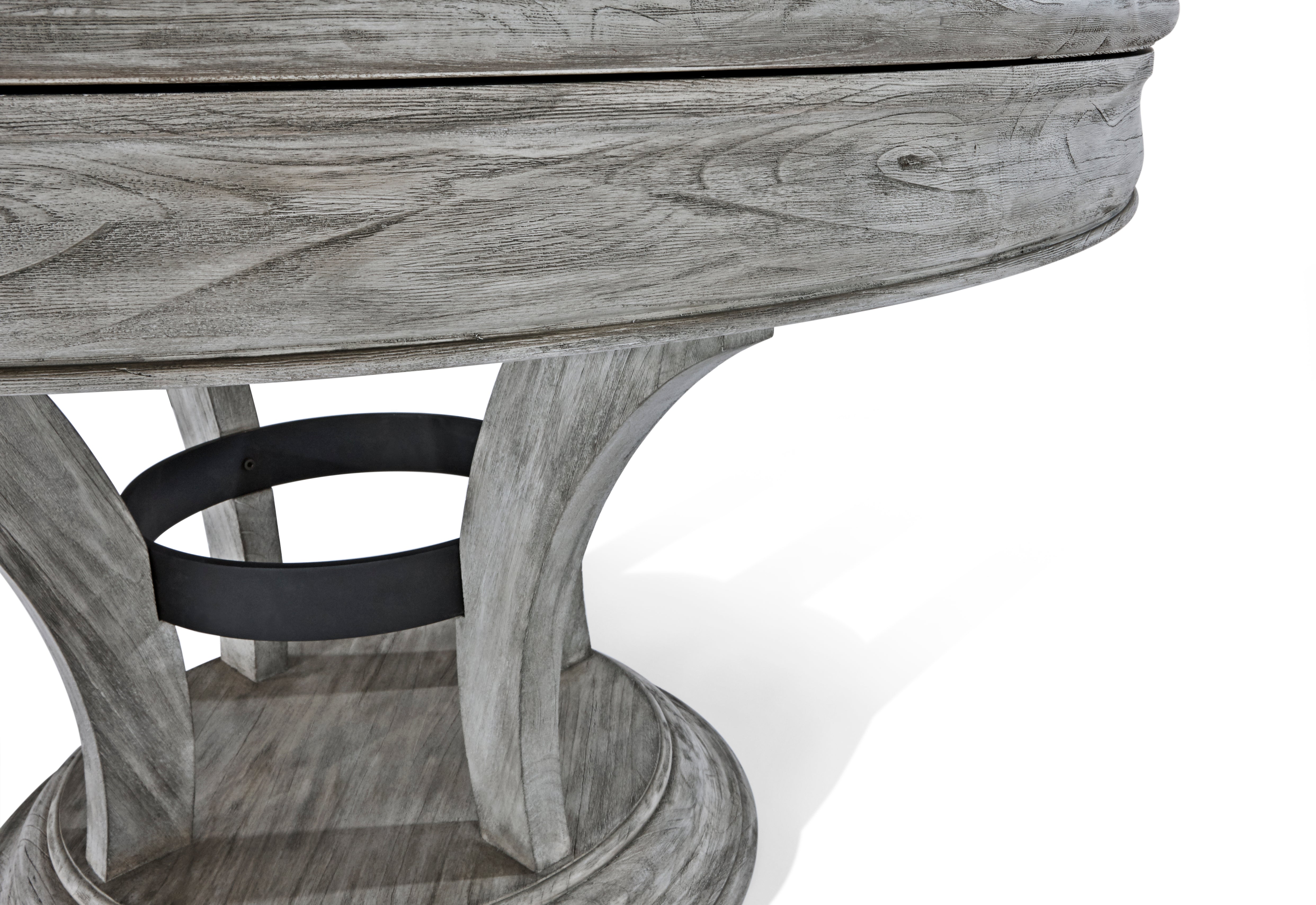 Close-up of the Brunswick Billiards Centennial Game Table base in Rustic Grey with curved legs.