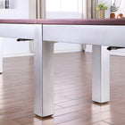 Playcraft Genoa 16' Pro-Style Shuffleboard Table with metallic legs and maroon top on wood floor.