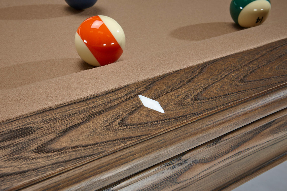 Brunswick Glenwood 7' Slate Pool Table in Coffee with billiard balls and diamond marker on rail.