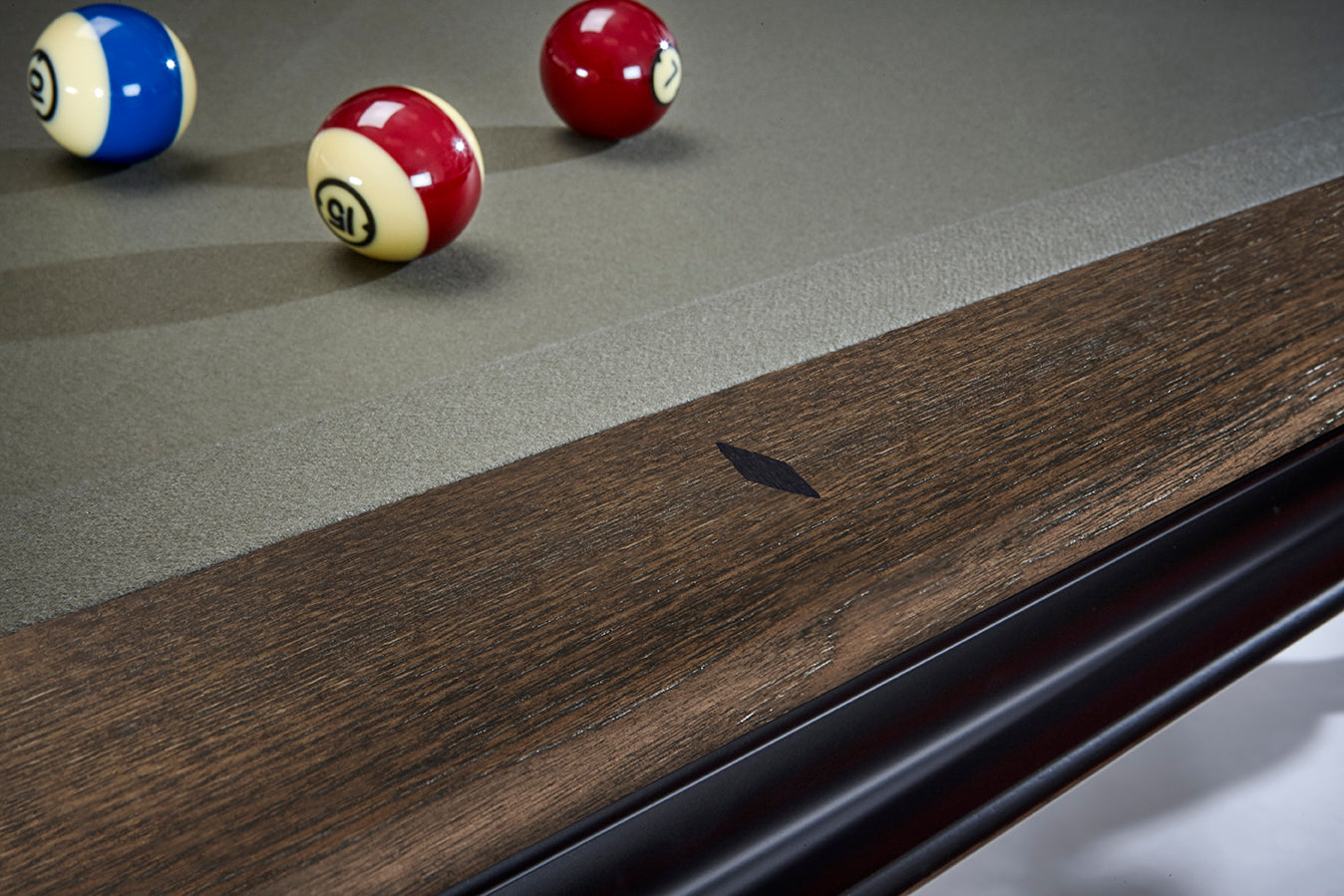Close-up of billiard balls on Brunswick Billiards Glenwood 7' Slate Pool Table in Matt Black.