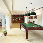A spacious room with a Brunswick Henderson 8' pool table, bookshelves, and large windows.