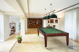 A spacious room with a Brunswick Henderson 8' pool table, bookshelves, and large windows.