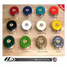 Collection of colorful weight caps on a wooden board with Hudson and JISU branding.