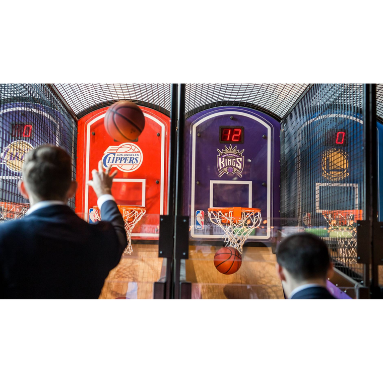 Two can play ICE NBA Hoops Matrix, an arcade basketball game with digital scoreboards.