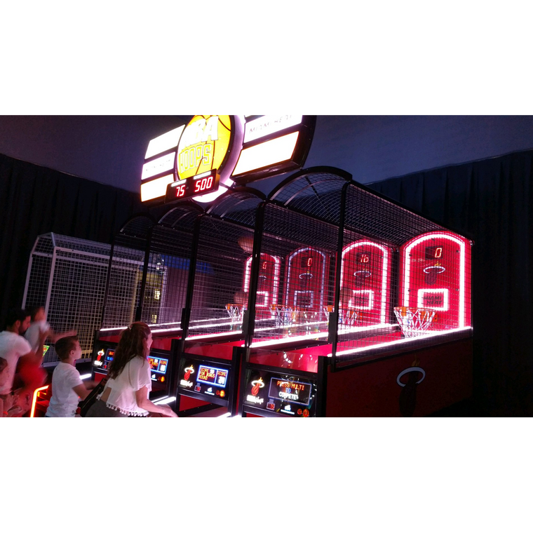 Players compete on the ICE NBA Hoops Matrix arcade game featuring vibrant custom NBA visuals.