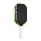 Pickleball paddle with green rim and white handle on a white background
