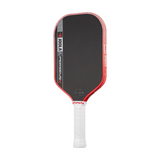 Pickleball paddle with black face and red edges on a white background