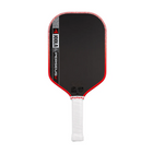 Pickleball paddle with black surface, red edges, and white handle on a white background