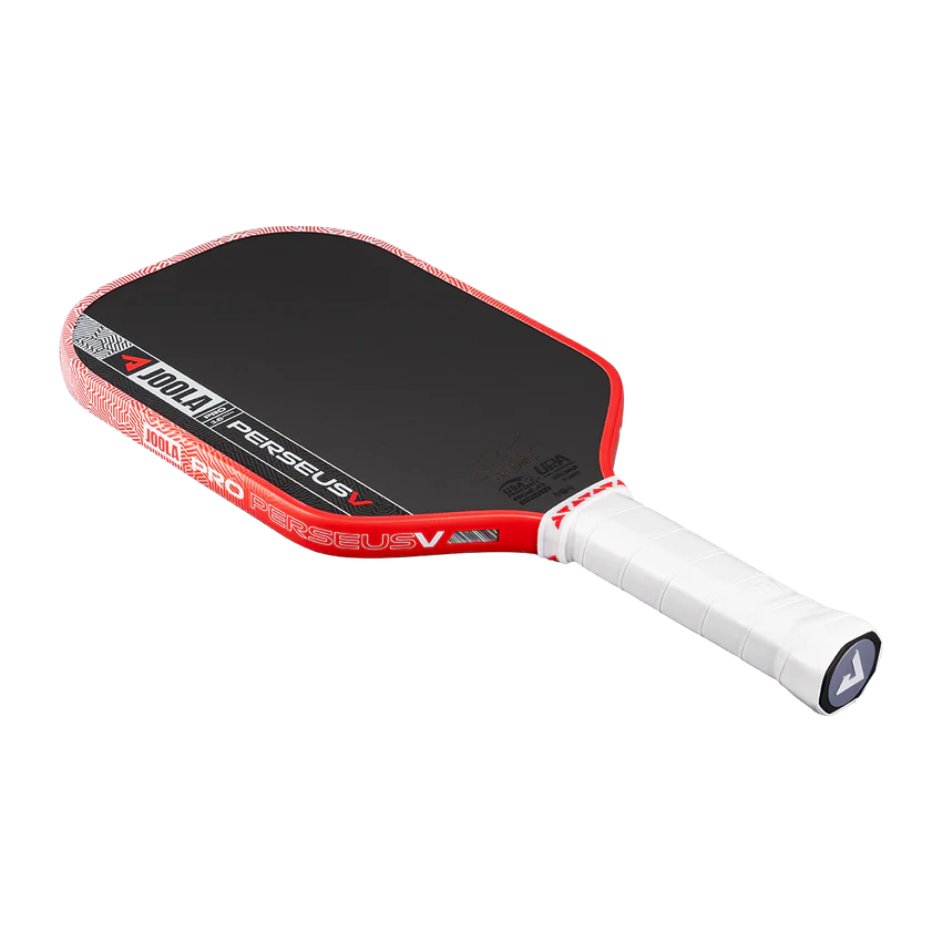 Red and black pickleball paddle with white handle on a white background