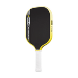 Pickleball paddle with black face, yellow rim, and white handle on a white background