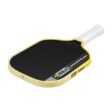 Pickleball paddle with black surface and yellow edges on a white handle against a black background