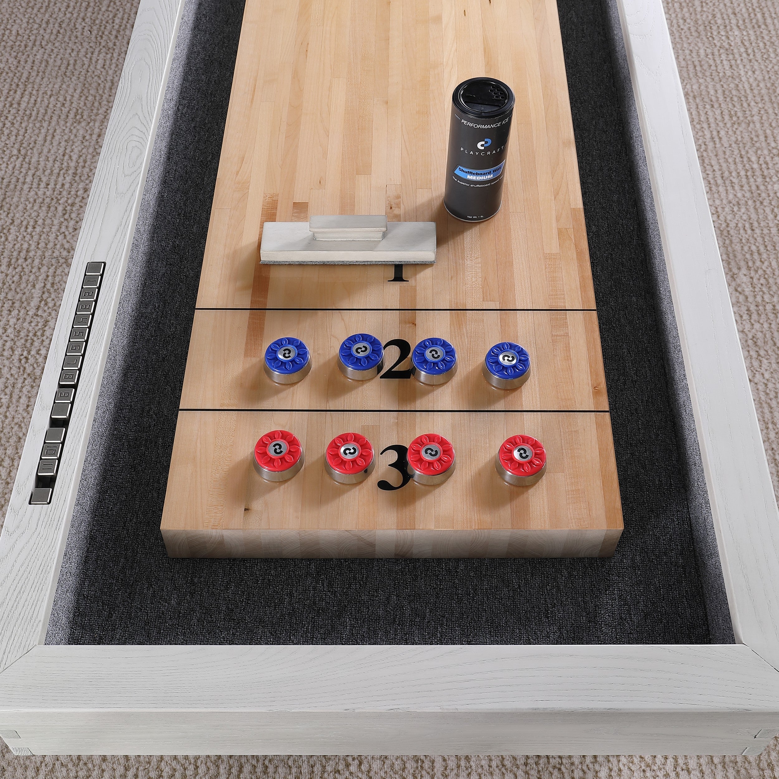Top view of Playcraft 16' Yukon Shuffleboard Table in Northern Drift with pucks and scoreboard.