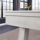 Close-up of Playcraft 16' Yukon Pro-Style Shuffleboard Table in Northern Drift in modern room.