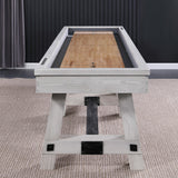 Playcraft 16' Yukon Pro-Style Shuffleboard Table in Northern Drift on carpet, dark wall behind.