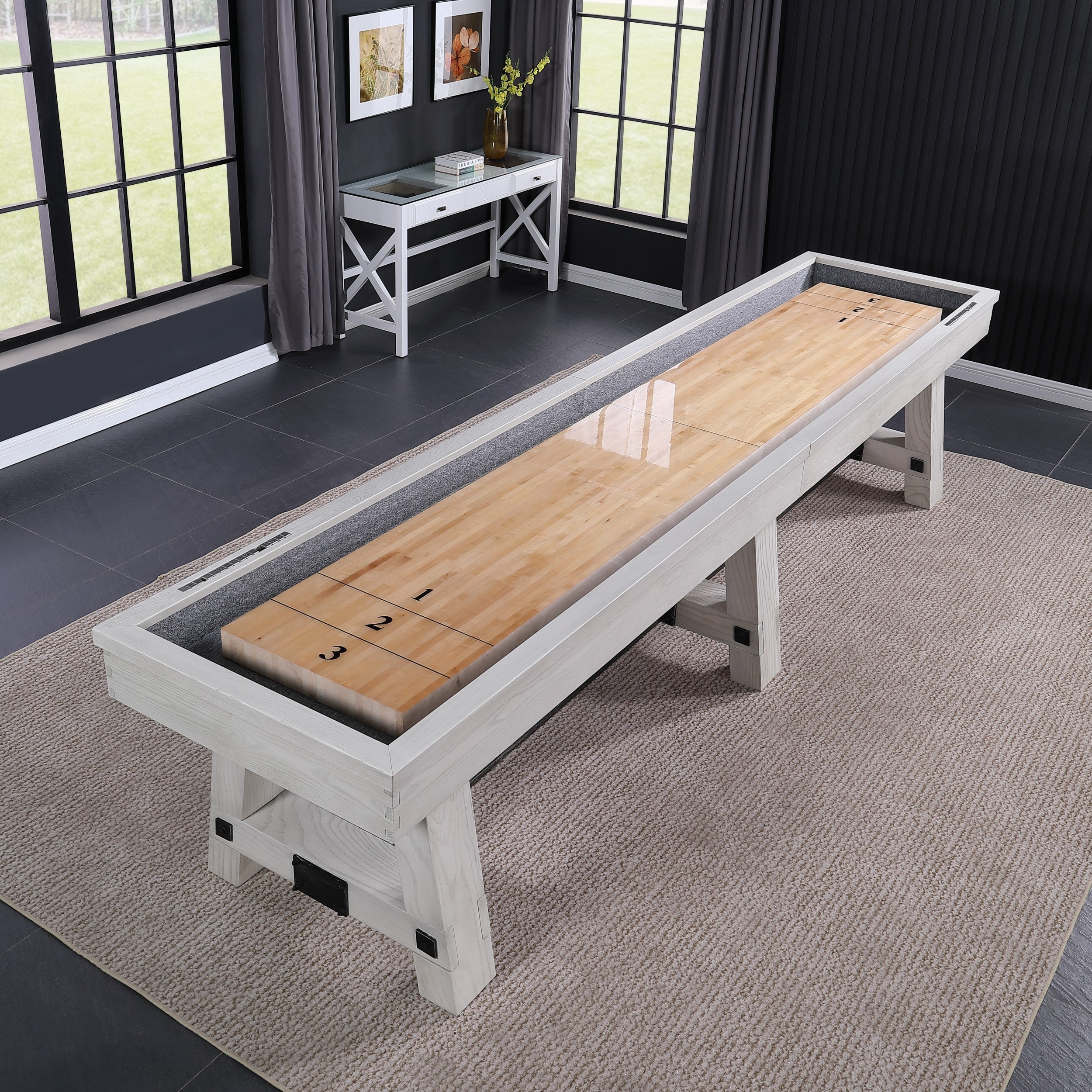 A Playcraft 16' Yukon Pro-Style Shuffleboard Table in Northern Drift sits on a rug in a modern room.